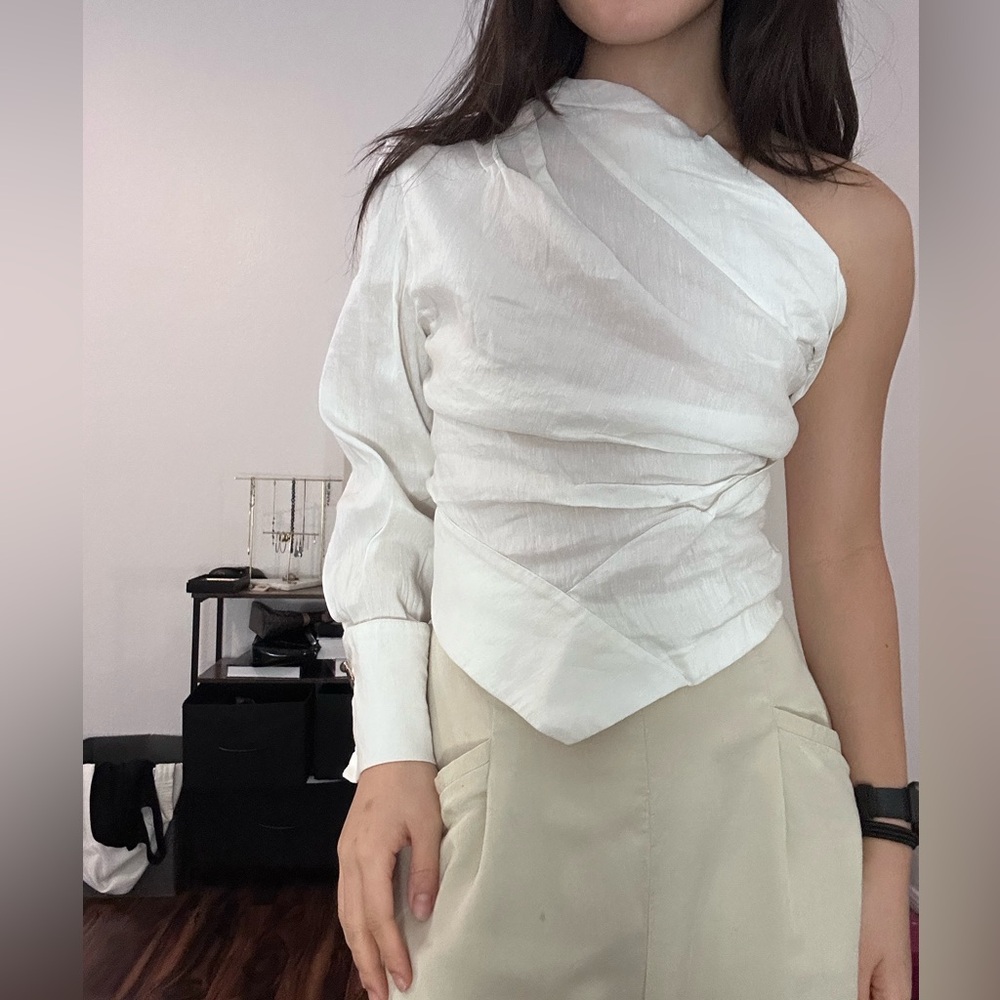 Zara one shoulder white linen top with gold hardware.
